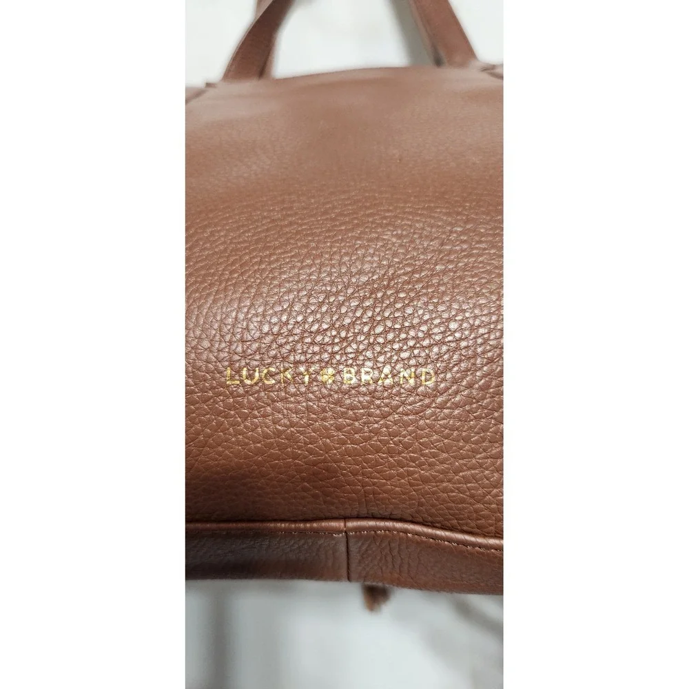 Lucky Brand Cognac Brown Pebbled Leather Tote Bag with Tassel and Clover Charm
